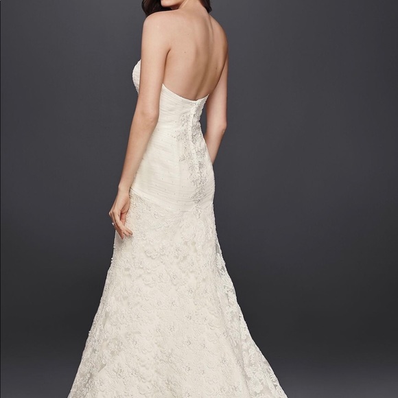 Never worn wedding dress - Picture 3 of 3